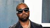 Kanye West defends his controversial Yeezy Gap display, where customers have to dumpster dive for clothes