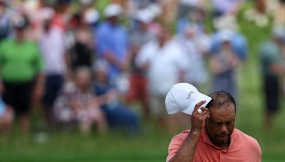 PGA Championship: Tiger Woods claws out a 1-over round on a scoring morning