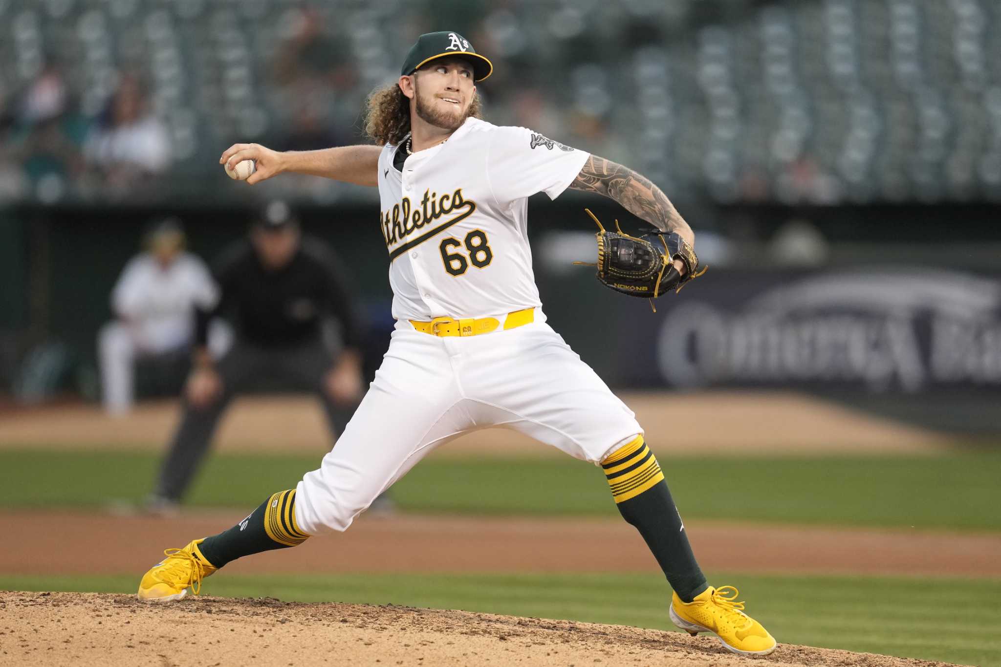 Joey Estes takes perfect game into 7th, Athletics beat Mariners 2-1