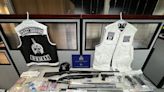 Dauphin RCMP seize firearms, weapons, drugs and gang clothing