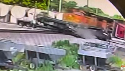 Train colliding with tractor trailer in West Plains, caught on camera