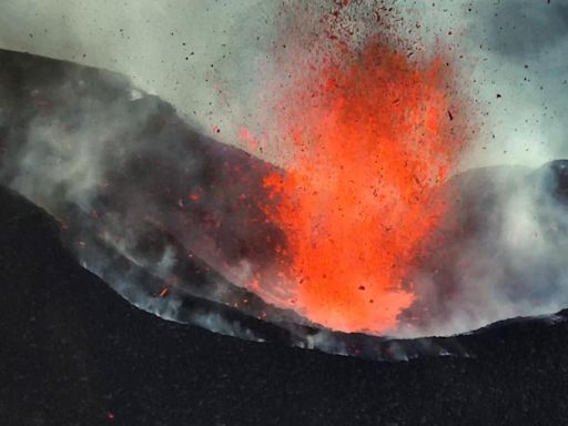 Rare footage shows powerful eruptions at peak of growing active volcano