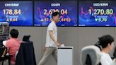 Stock market today: Asian shares track Wall Street rally, Bank of Japan stands pat