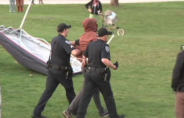 Police taking protestors into custody at University of New Hampshire