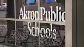 Akron school board votes to cut nearly 300 positions