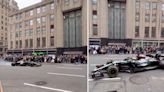Lewis Hamilton does doughnuts outside Empire State Building in New York