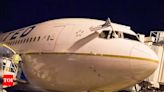 United Airlines jet turns back after engine piece falls off - Times of India