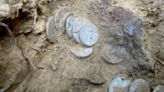 2,000-year-old hoard of Roman coins may have been hidden by a soldier during a bloody civil war in Italy