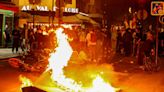 Violent protest against far-right National Rally erupt in Paris as Macron urges tactical voting