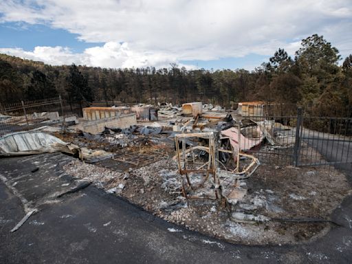 Team combs fire-ravaged New Mexico community for remains of the missing