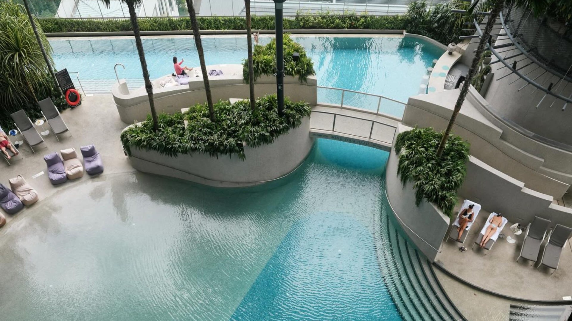 Inside Singapore's garden hotel that's half JUNGLE - with its own waterfall