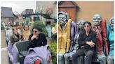 Tim Burton pictured on Alice in Wonderland ride at Blackpool Pleasure Beach