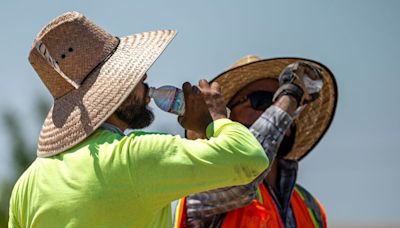 A ‘potentially historic’ heat wave intensifies along the West Coast, as dangerous wildfires spread