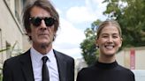 Rosamund Pike attends Paris Fashion Week with partner Robie Uniacke