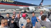 Blowback after Trump seen taking selfies with police officers