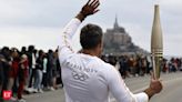 France's Bastille Day parade meets the Olympic torch relay in an exceptional year