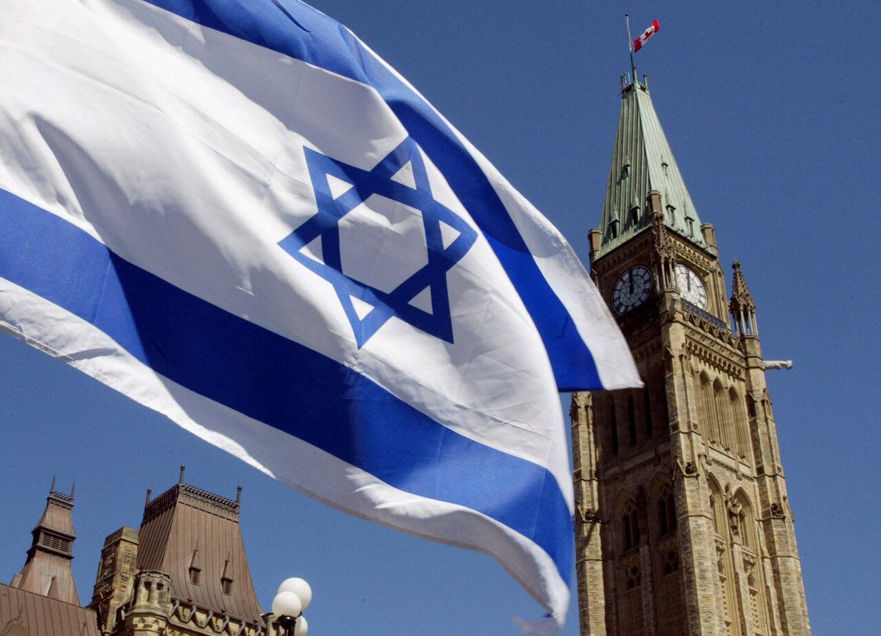 Decision to fly Israeli flag, cancel ceremony at city hall gets pushback from both sides