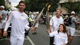 Journalist wounded in Israeli strike on Lebanon carries Olympic torch in France