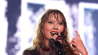 Fans Can't Get Over Taylor Swift's Little Giggle While Referencing Travis Kelce on Stage: 'Love Looks So Good on Her'