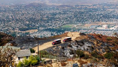 Firefighters gaining control over destructive Southern California wildfires