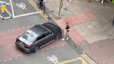 Shocking moment driver parks on pedestrian crossing in city centre so he can go to Tesco