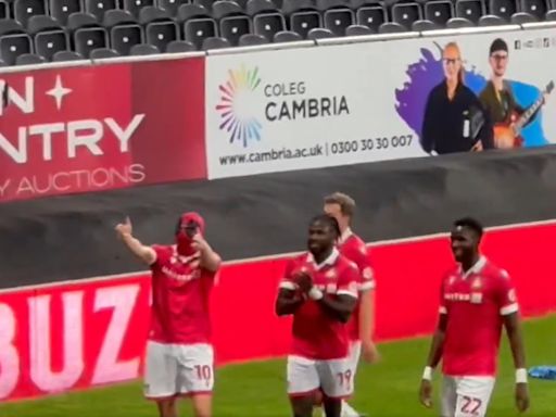 Wrexham striker Paul Mullin celebrates goal with Deadpool mask in funny tribute