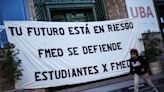 'We will teach by candlelight': Argentine students and teachers protest Milei budget cuts