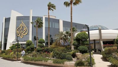 Al Jazeera office raided as Israel takes channel off air