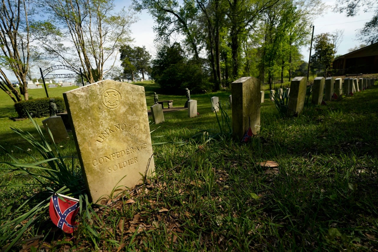 A Mississippi town moves a Confederate monument that became a shrouded eyesore