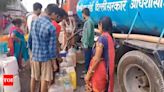 Delhi water crisis: Long queues continue to form near tankers across capital | Delhi News - Times of India