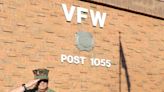 Young Marines salute flags during ceremony at Ravenna VFW post