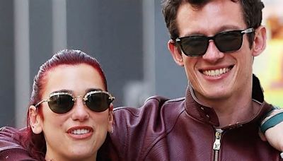 Dua Lipa and her boyfriend Callum Turner put on a loved-up display as they cosy up during stroll in NYC