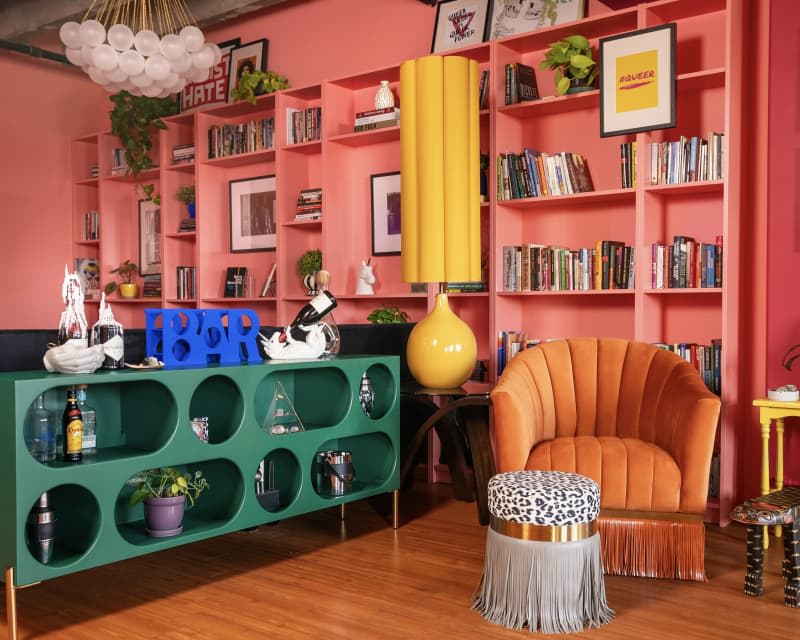 This Extremely Colorful Loft Has 9 Electric Pink IKEA Bookshelves