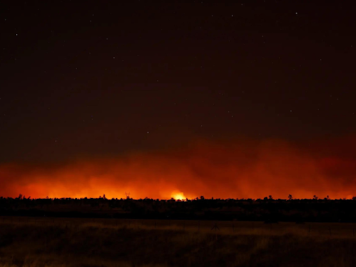 Burning car pushed into gully, lightning fan Western US wildfires - Times of India