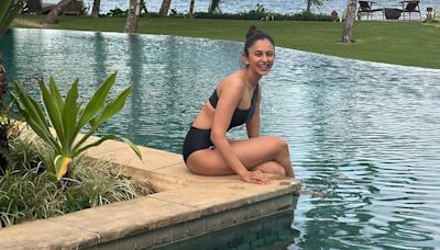 Rakul Preet Singh "Did It All" In Fiji In A Fantastical Black Cutout Swimsuit