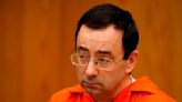 Justice Department reaches settlement with Larry Nassar victims