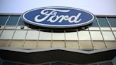 Ford shares surge on dividend boost, lower EV spending