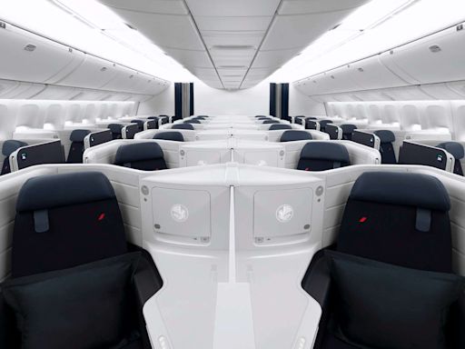 I Flew in the World's Most Spacious Business-class Seat — Complete With Lie-flat Seats, Sliding Doors, and 17-inch Screens