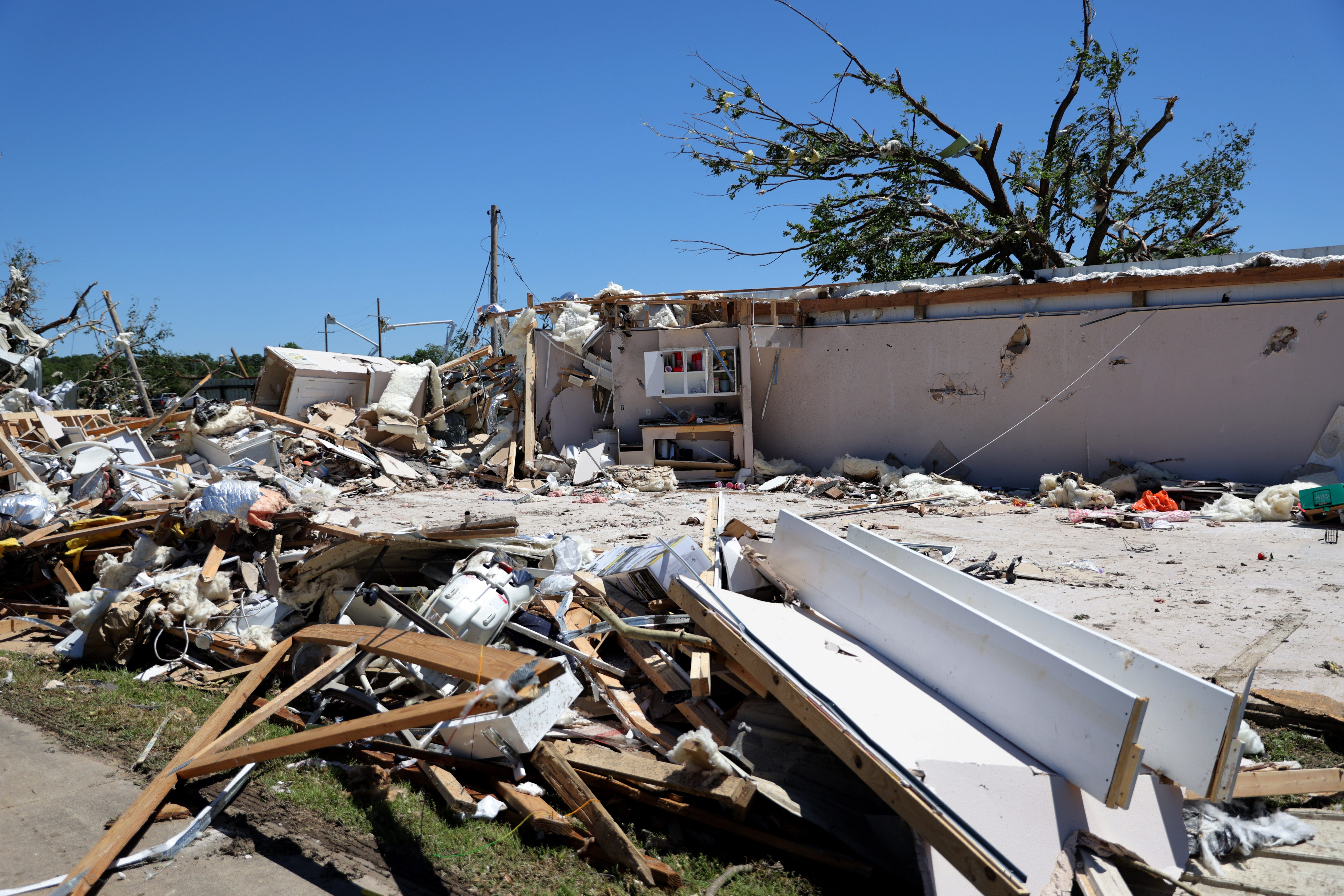 A tornado tore through a Barnsdall church May 6. But the altar — and a single lit candle — were untouched