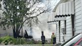 Fire rages against detached garage in Dayton