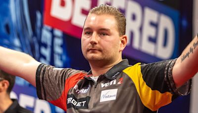 World Matchplay Darts: Dimitri Van den Bergh hits nine-darter as Rob Cross survives scare and Peter Wright goes out