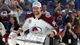 Another Avalanche player wipes out while carrying Stanley Cup