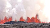 Iceland volcano dramatically erupts again as streams of lava reach town’s defensive walls