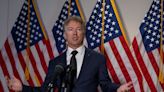 Rand Paul calls for disqualification of a Democratic Senate candidate over past jokes about the Kentucky Republican's broken rib from a violent neighbor