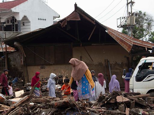 Indonesia seeds clouds to block rainfall after floods killed at least 59 people while 16 are missing