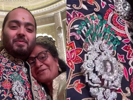 Anant Ambani wore a brooch with Dhirubhai Ambani's picture at his wedding reception - Times of India