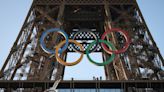 Paris Olympics organizers unveil five Olympic rings mounted on the Eiffel Tower