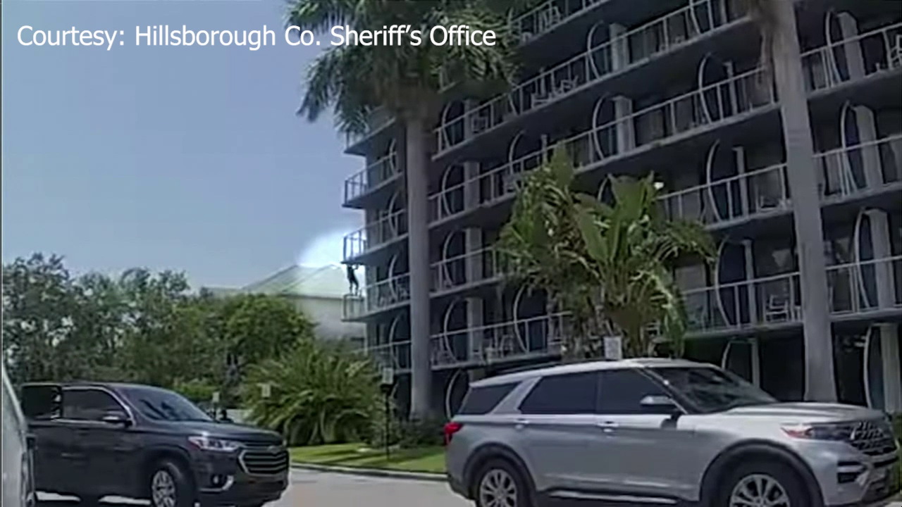 VIDEO: Armed robbery suspect jumps across balconies moments before arrest at Tampa hotel