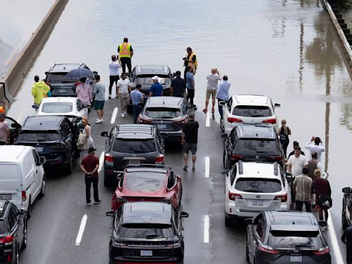 Flooding on highway in Toronto as torrential rain hits city