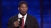 Herschel Walker Flashes Seemingly Bogus Police Badge at Debate, Gets Trolled Online